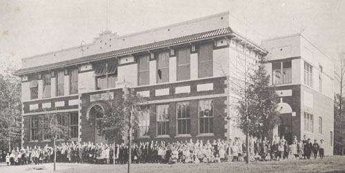 Model School with students standing around, 1918. Photo available from ECU Archives,  from TSQ, volume 5, page 246.