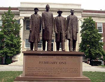 Photograph of statue of the A&T Four (Greensboro Four) on the campus of North Carolina A&T University, Greensboro, N.C., by cewatkin, 2000 Wikimedia Commons.  Used with Creative Commons CC-BY-SA 3.0 license.