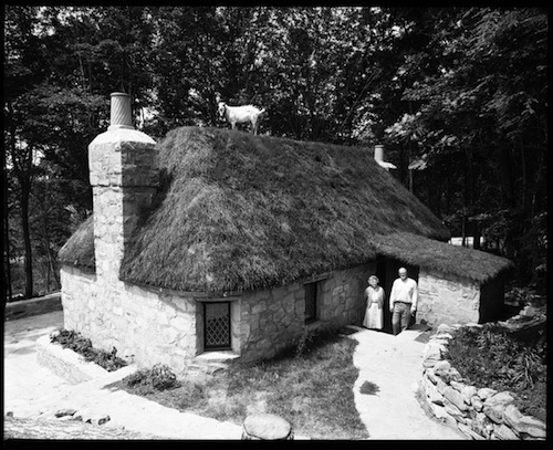 Photo of the Croft House with a goat on the roof