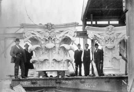 Italian master carvers were employed at the Mount Airy Granite Company in the early 1900s; here, column capitals they have crafted are loaded on a railroad car. North Carolina Collection, University of North Carolina at Chapel Hill Library.