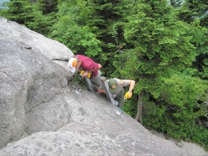 Staff replacing rock anchors on McCrae's Peak, Grandfather Mountain State Park. From the collection of North Carolina State Parks.