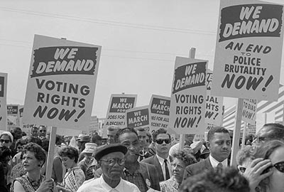 This photograph is of black and white marchers on August 28, 1963, during the historic March on Washington. Image from Library of Congress.