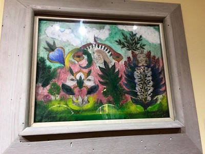 Photograph of Minnie Evans's artwork titled, "Visions" that is on display at the Hickory Museum of Art.