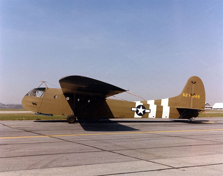 Photograph of a CG-4A World War II cargo glider, constructed of fabric-covered wood and metal. Image from the National Museum of the U.S. Air Force.