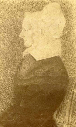 Mary "Polly" Williams Burke. She is depicted facing left, with a collared dress covering her entirely. She is wearing a bonnet. She looks thin.