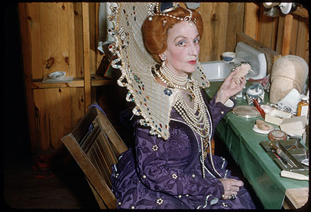 Photograph of Lillian Hughes Prince putting on her makeup as Queen Elizabeth in the "The Lost Colony,"1952. Item 1952.62.55 from the collection of the North Carolina Museum of History. Used by permission.