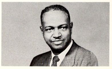Head and shoulders portrait of Samuel Duncan in a suit jacket and tie. Black and white photo.