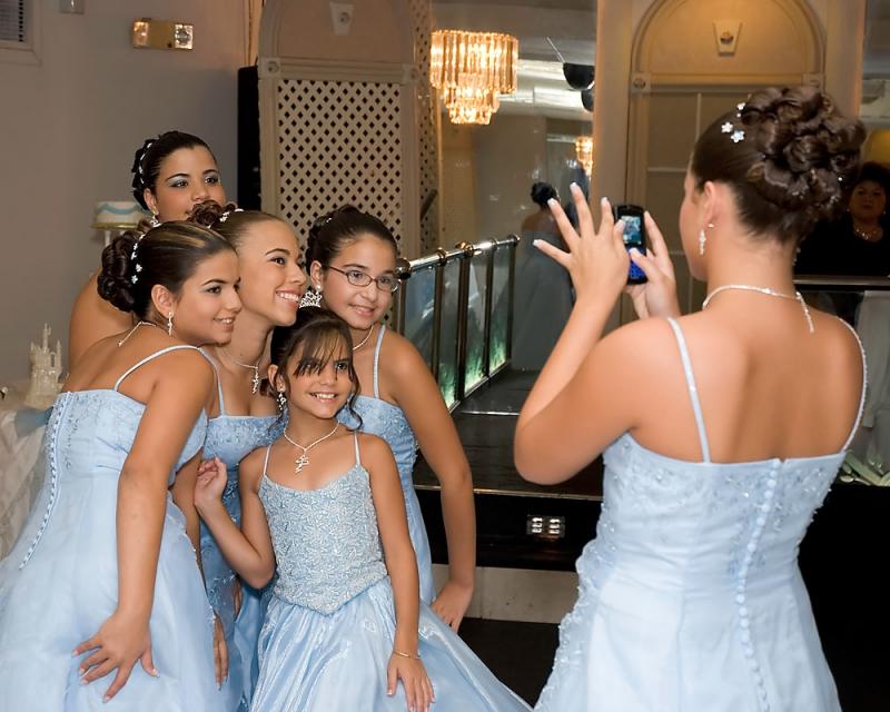 <img typeof="foaf:Image" src="http://statelibrarync.org/learnnc/sites/default/files/images/11saycheese.JPG" width="1000" height="800" alt="Quinceañera posing for Pictures" title="Quinceañera posing for Pictures" />