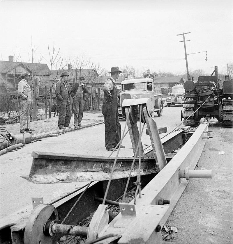 <img typeof="foaf:Image" src="http://statelibrarync.org/learnnc/sites/default/files/images/8e11036v.jpg" width="924" height="969" alt="Buried trolley tracks salvaged to aid war program" title="Buried trolley tracks salvaged to aid war program" />