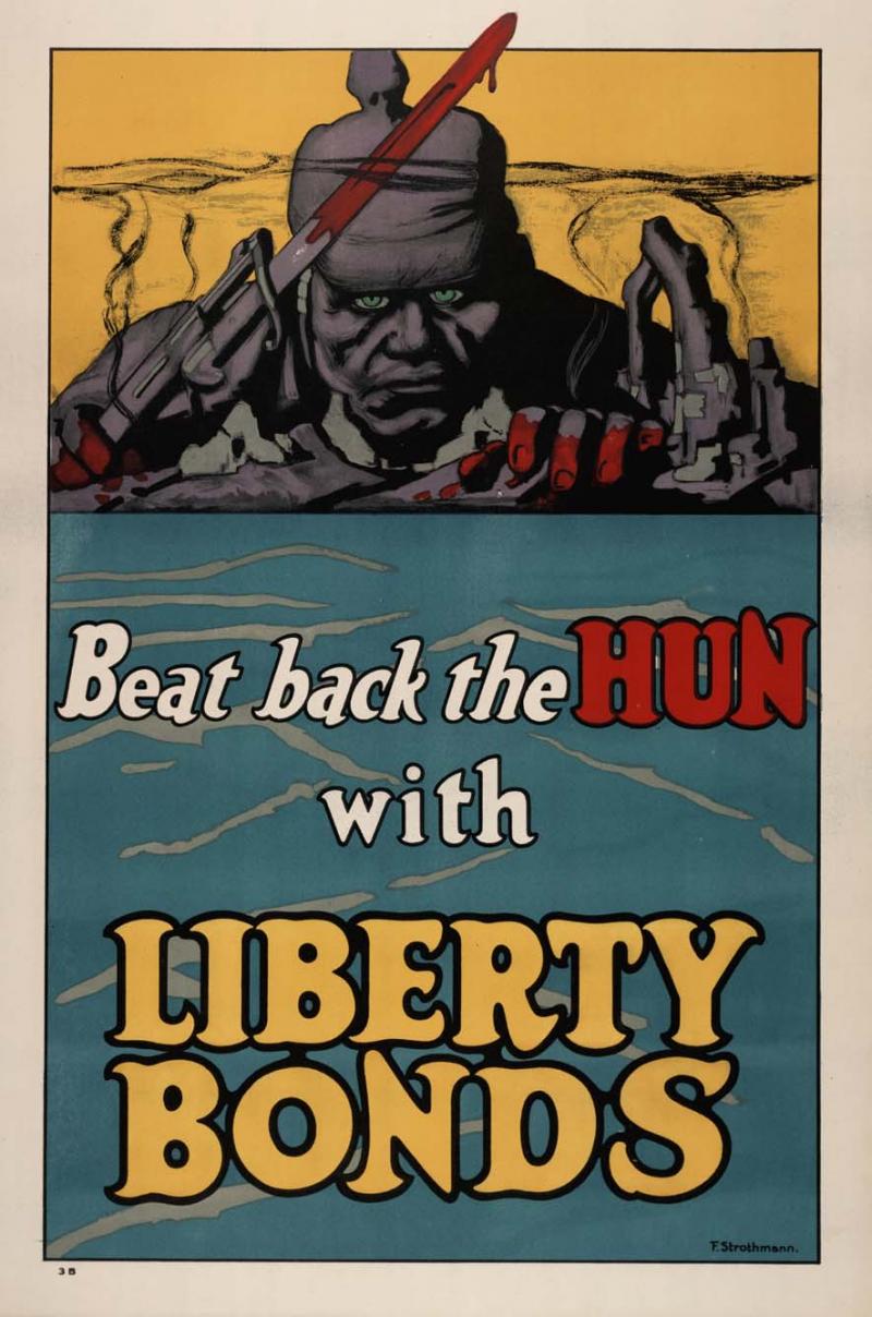 Beat back the Hun with Liberty Bonds promotional poster. It depicts a German solider with a bloody bayonet and a helmet looking over the edge of a trench. He has piercing, green eyes.