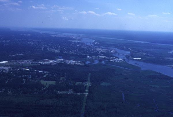 Zero salinity area of the North East Cape Fear River Aerial photo. Small plots of land and the Cape Fear River are visible. Mostly woodland.