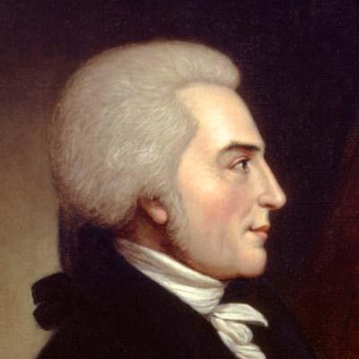 From UNC: "A posed portrait of a man with long gray hair, which may be a wig, tied back with a ribbon, wearing a white neck kerchief and dark jacket, facing right."
