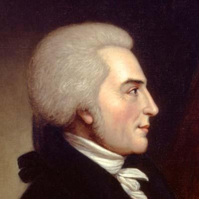 William Richardson Davie From UNC: "A posed portrait of a man with long gray hair, which may be a wig, tied back with a ribbon, wearing a white neck kerchief and dark jacket, facing right."