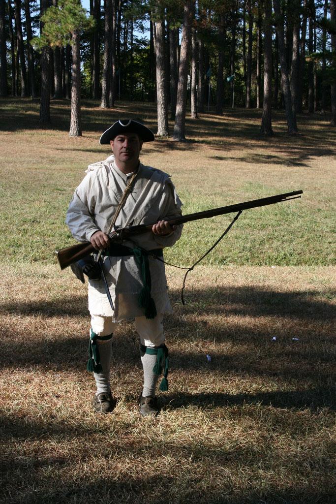 <img typeof="foaf:Image" src="http://statelibrarync.org/learnnc/sites/default/files/images/img_1628.jpg" width="683" height="1024" alt="Regulator re-enactor with musket" title="Regulator re-enactor with musket" />