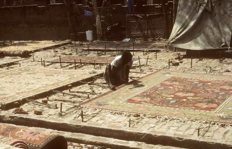 <img typeof="foaf:Image" src="http://statelibrarync.org/learnnc/sites/default/files/images/india_144.jpg" width="1024" height="661" alt="Stretching carpets in Agra, India" title="Stretching carpets in Agra, India" /> <img typeof="foaf:Image" src="http://statelibrarync.org/learnnc/sites/default/files/images/india_144.jpg" width="1024" height="661" alt="Stretching carpets in Agra, India" title="Stretching carpets in Agra, India" />