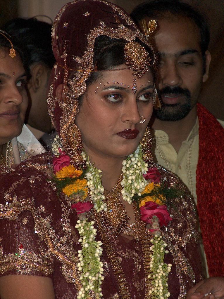 <img typeof="foaf:Image" src="http://statelibrarync.org/learnnc/sites/default/files/images/india_bride.jpg" width="766" height="1024" alt="Bride in India" title="Bride in India" />