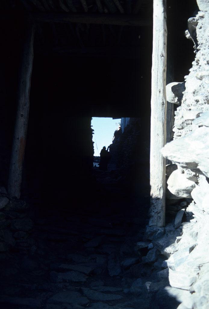 <img typeof="foaf:Image" src="http://statelibrarync.org/learnnc/sites/default/files/images/nepal_180.jpg" width="694" height="1024" alt="Tunnel into Kagbeni village, Nepal" title="Tunnel into Kagbeni village, Nepal" />