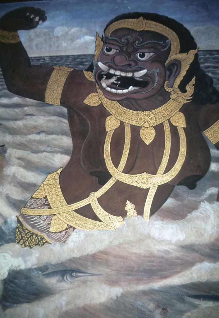 <img typeof="foaf:Image" src="http://statelibrarync.org/learnnc/sites/default/files/images/thai_rama_101.jpg" width="705" height="1024" alt="Tiny Hanuman enters mouth of demon guard standing in waves" title="Tiny Hanuman enters mouth of demon guard standing in waves" />