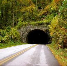 <img typeof="foaf:Image" src="http://statelibrarync.org/learnnc/sites/default/files/images/tunnel.jpg" width="227" height="222" alt="Tunnel in the NC mountains" title="Tunnel in the NC mountains" />