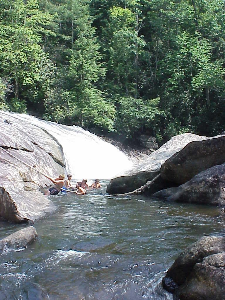 <img typeof="foaf:Image" src="http://statelibrarync.org/learnnc/sites/default/files/images/turtleback_falls.jpg" width="768" height="1024" alt="Boy Scouts sliding down Turtleback Falls, with forest above" title="Boy Scouts sliding down Turtleback Falls, with forest above" />