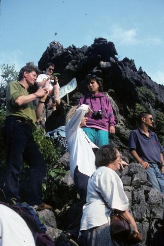 <img typeof="foaf:Image" src="http://statelibrarync.org/learnnc/sites/default/files/images/vietnam_003.jpg" width="333" height="500" alt="Tourist group of seven people standing on steep rocks" title="Tourist group of seven people standing on steep rocks" />