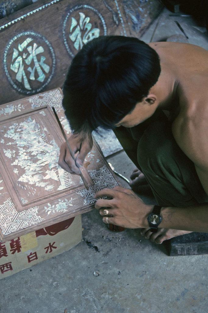<img typeof="foaf:Image" src="http://statelibrarync.org/learnnc/sites/default/files/images/vietnam_111.jpg" width="683" height="1024" alt="Man applies inlay designs to a wood plaque, Hoi An" title="Man applies inlay designs to a wood plaque, Hoi An" /> <img typeof="foaf:Image" src="http://statelibrarync.org/learnnc/sites/default/files/images/vietnam_111.jpg" width="683" height="1024" alt="Man applies inlay designs to a wood plaque, Hoi An" title="Man applies inlay designs to a wood plaque, Hoi An" />