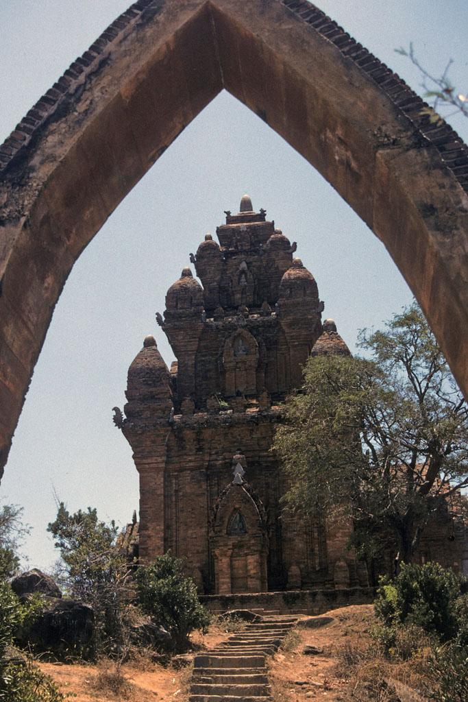 <img typeof="foaf:Image" src="http://statelibrarync.org/learnnc/sites/default/files/images/vietnam_126.jpg" width="683" height="1024" alt="Cham tower seen through an archway in Po Nagar complex at Nha Trang" title="Cham tower seen through an archway in Po Nagar complex at Nha Trang" />