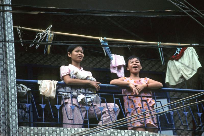 <img typeof="foaf:Image" src="http://statelibrarync.org/learnnc/sites/default/files/images/vietnam_161.jpg" width="1024" height="683" alt="Woman and girl with laundry on balcony, Ho Chi Minh City's Chinatown" title="Woman and girl with laundry on balcony, Ho Chi Minh City's Chinatown" />