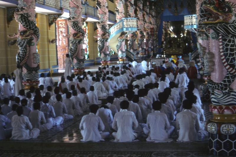 <img typeof="foaf:Image" src="http://statelibrarync.org/learnnc/sites/default/files/images/vietnam_174.jpg" width="1024" height="683" alt="Followers dressed in white sit worshipping in Cao Dai temple at Tay Ninh" title="Followers dressed in white sit worshipping in Cao Dai temple at Tay Ninh" />