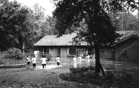 <img typeof="foaf:Image" src="http://statelibrarync.org/learnnc/sites/default/files/images/wading_0.jpg" width="590" height="375" alt="Saving a piano from floodwaters" title="Saving a piano from floodwaters" />