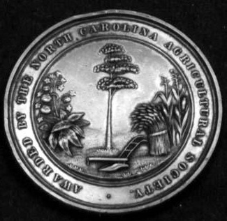 Medal awarded by the North Carolina Agricultural Society for contests at the State Fair, 1853. Image from the North Carolina Museum of History.