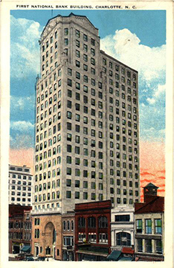 A postcard depicting a skyscraper bank in Charlotte, NC.