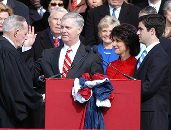 Michael Easley Jr., left, son of Governor Mike Easley, center