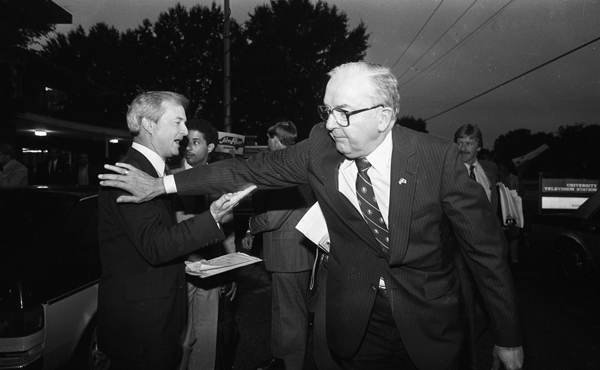 James Hunt and Jesse Helms attending a debate July 29, 1984. Copyright News & Observer, all rights reserved. Used with permission. Housed at the N.C. State Archives, call no. NO_042184_Fr39.