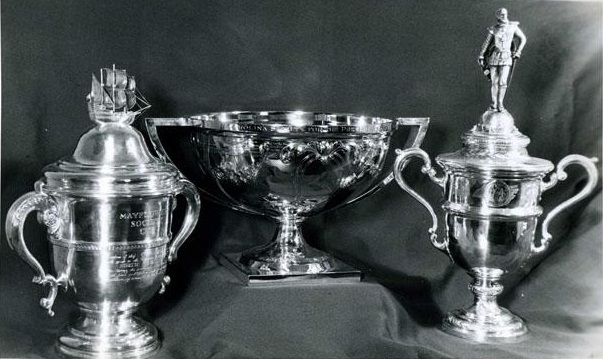 From left to right, the Mayflower Cup awarded by the Society of Mayflower Descendants in the State of North Carolina, the Ruth Coltrane Cannon Cup awarded by Preservation North Carolina, and the Sir Walter Raleigh Award awarded by the Historical Book Club of North Carolina
