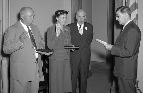 Members of the Rural Electrification Authority being sworn in. From left to right, S.H. Hobbs, Jr. of Chapel Hill, Mrs. Fred Davis of Stoneville, Governor Luther Hodges, and Associate Justice Jeff Johnson Jr., 1955. Image from the State Archives of North Carolina. 