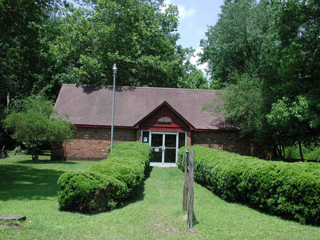 A photograph of the Indian Museum of the Carolinas building in Laurinburg, NC (now the Carolinas Indian Museum)