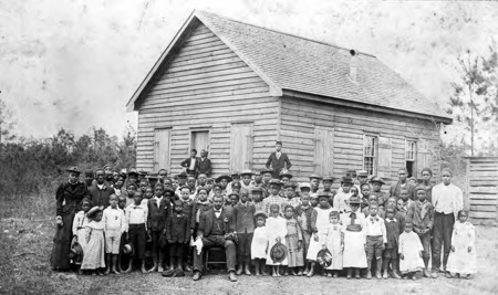 Students and teacher in front of Professor Jacobs school, early 1900's.