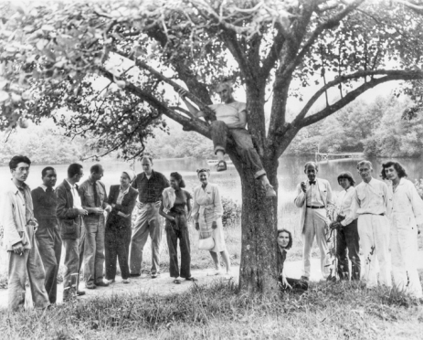 Summer Institute at Black Mountain College, 1946. Left to right: Leo Amino, Jacob Lawrence, Leo Lionni, Theodore Dreier, Nora Lionni, Beaumont Newhall, Gwendolyn Lawrence, Ise Gropius, Jean Varda (in tree), Nancy Newhall (sitting), Walter Gropius, Mary Gregory, Josef Albers, and Anni Albers. Courtesy of North Carolina Office of Archives and History, Raleigh.