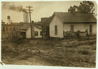 Some of the housing conditions of the workers in Cannon Mills, Concord, N.C., to contrast with the homes and gardens sometimes shown from the "show mills" of the state. Concord, NC, 1912. Image courtesy of the Library of Congress. 