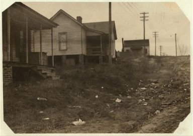 Some of the housing conditions of the workers in the Cannon Mills to contrast with the homes and gardens some times shown from the "show mills" of the state, 1912. Image courtesy of Library of Congress. 