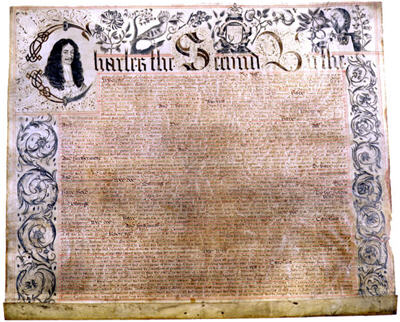 The first page of the Carolina charter of 1663. In the charter, Charles II (shown at upper left) conveyed vast lands extending to the Pacific Ocean and including what is now North Carolina to eight of his supporters, known subsequently as the Lords Proprietors. Courtesy of North Carolina Office of Archives and History, Raleigh.