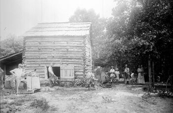 Curing tobacco. From the Barden Collection, North Carolina State Archives, call #:  N.53.16.4450. 