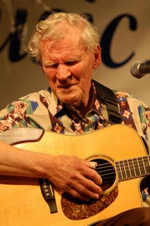 "Doc Watson, 86 years old, plays to the crowd at another fantastic Sugar Grove Music Fest.." Image courtesy of Flickr user Joe Giodorno, taken on July 11, 2009. 