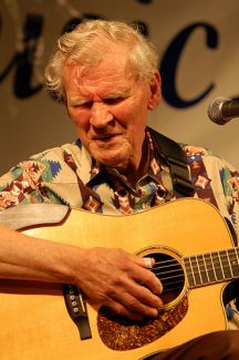 "Doc Watson, 86 years old, plays to the crowd at another fantastic Sugar Grove Music Fest.." Image courtesy of Flickr user Joe Giodorno, taken on July 11, 2009.