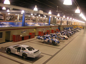 Penske's NASCAR Garage in Mooresville, N.C., by Mrmiscellaneous. Licensed under CC BY 2.5 via Wikimedia Commons. 