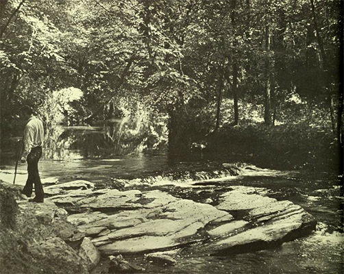 Photograph of a hiker on the river in the 1970's.