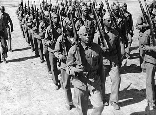 Black marines in formation with guns. Black and white photo.