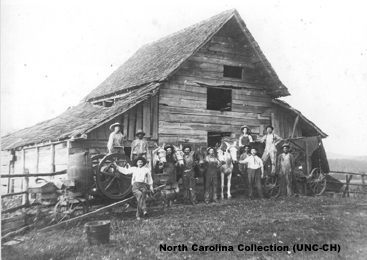 Men gathered for wheat threshing