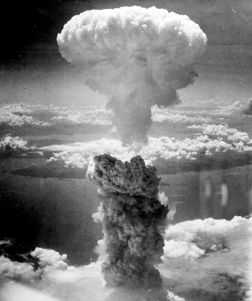A giant mushroom cloud with a large circumference on top and narrower on the shaft.
